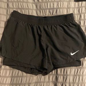 Nike running shorts with spandex liner.